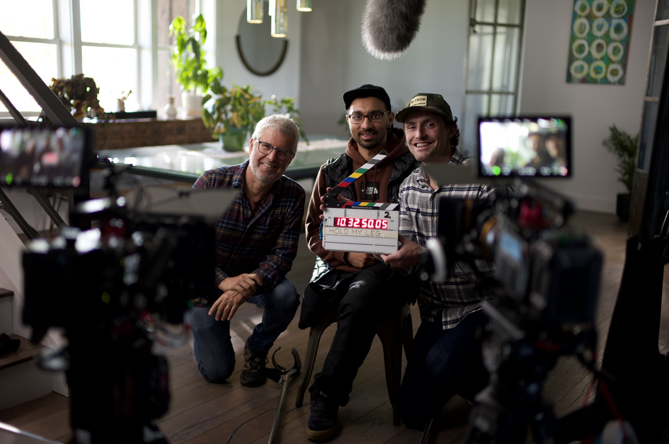 Yair Landau, at left, with the Hold My Leg interview crew